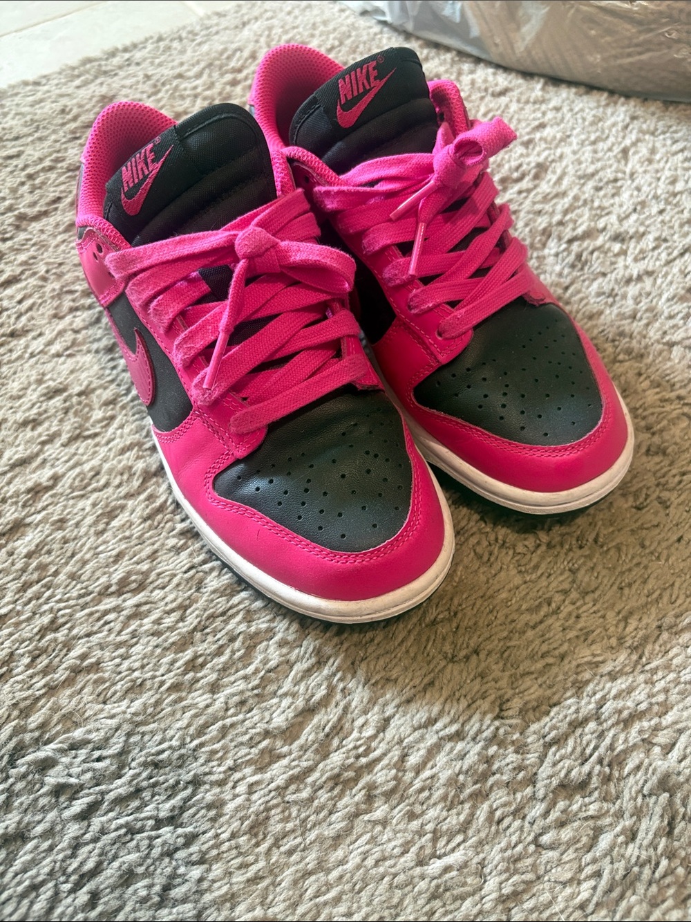 Nike Women’s Dunks Low-Top Sneakers in Hot Pink and Black
